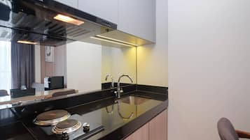 Fridge, stovetop, cookware/dishes/utensils