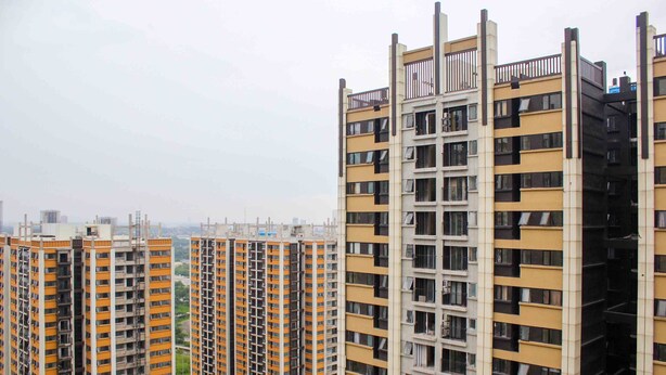A high-rise residential building with multiple balconies and a uniform architectural style. - Comfort And Serene 2Br At Meikarta Apartment (Cikarang)