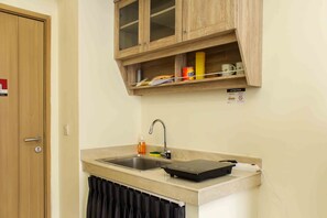 Room | Private kitchen - Comfort And Serene 2Br At Meikarta Apartment (Cikarang)