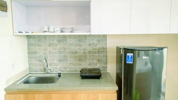 Quarto | Cozinha privada | Geladeira, cooktop, chaleira elétrica