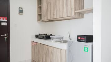 Quarto | Cozinha privada | Geladeira, cooktop, chaleira elétrica