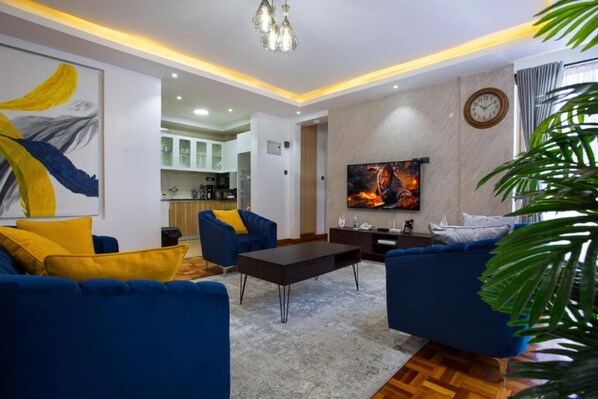 อพาร์ทเมนท์, 1 ห้องนอน | บริเวณนั่งเล่น | ทีวี