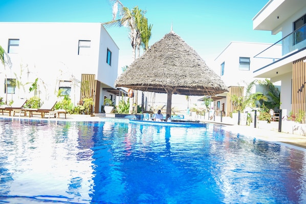 2 outdoor pools, pool umbrellas, sun loungers