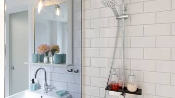 Shower, hair dryer, towels, soap