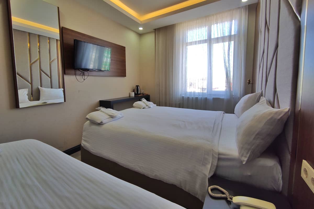 1 habitación, tabla de planchar con plancha, wifi gratis y ropa de cama