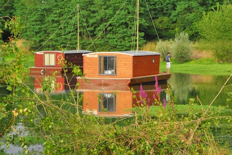 Exterior. Cabin dinghy at anchor