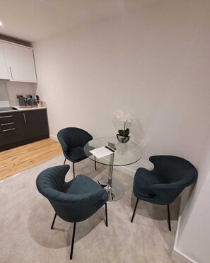 Deluxe Apartment | Living area | 43-inch Smart TV with satellite channels, TV, offices