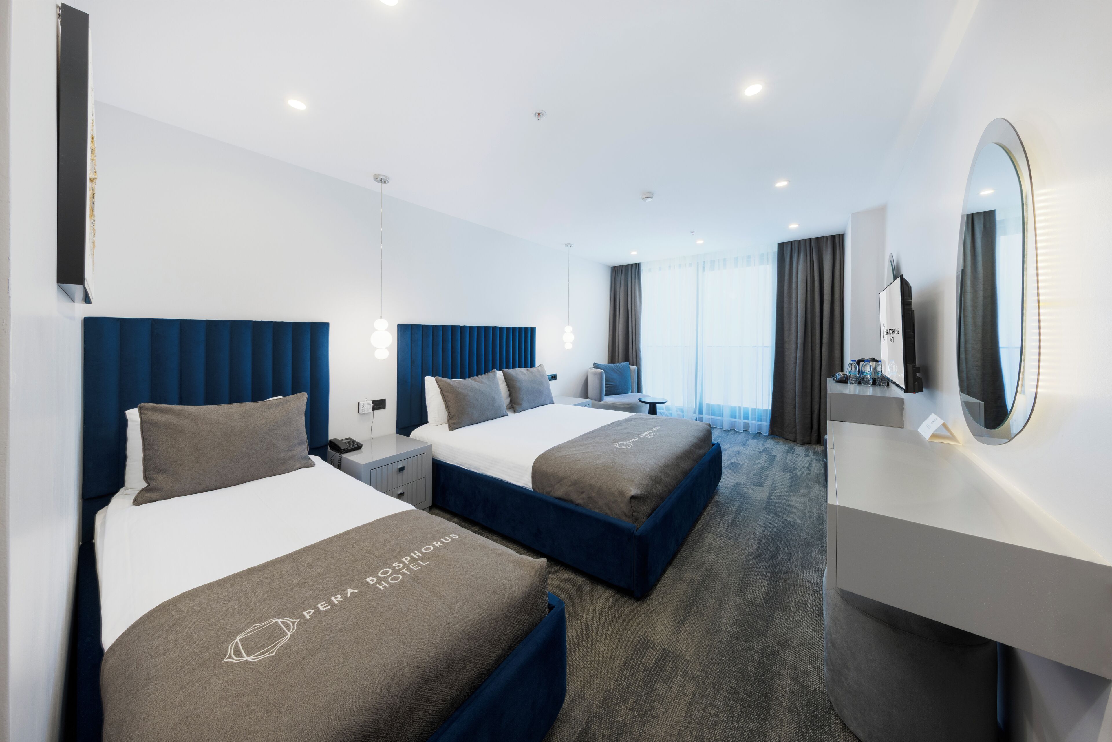 Standard Triple Room | Premium bedding, minibar, in-room safe, laptop workspace