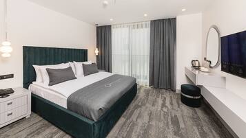 Premium bedding, minibar, in-room safe, laptop workspace