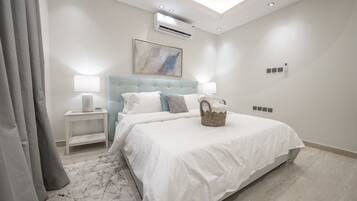 Apartment, 2 Bedrooms | 2 bedrooms, iron/ironing board, individually decorated