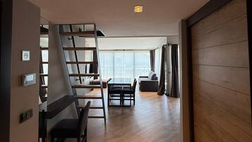 Design Loft | Premium bedding, in-room safe, individually decorated