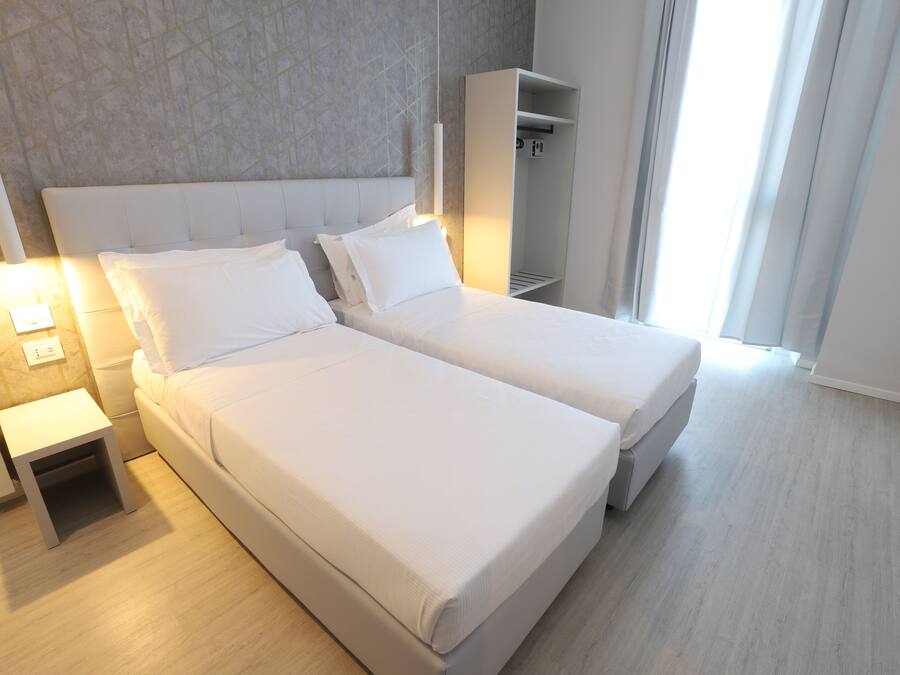 Chambre avec lits jumeaux | Couette en duvet d'oie, minibar, coffres-forts dans les chambres