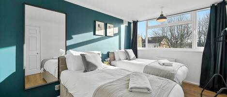 3 bedrooms, desk, iron/ironing board, travel cot