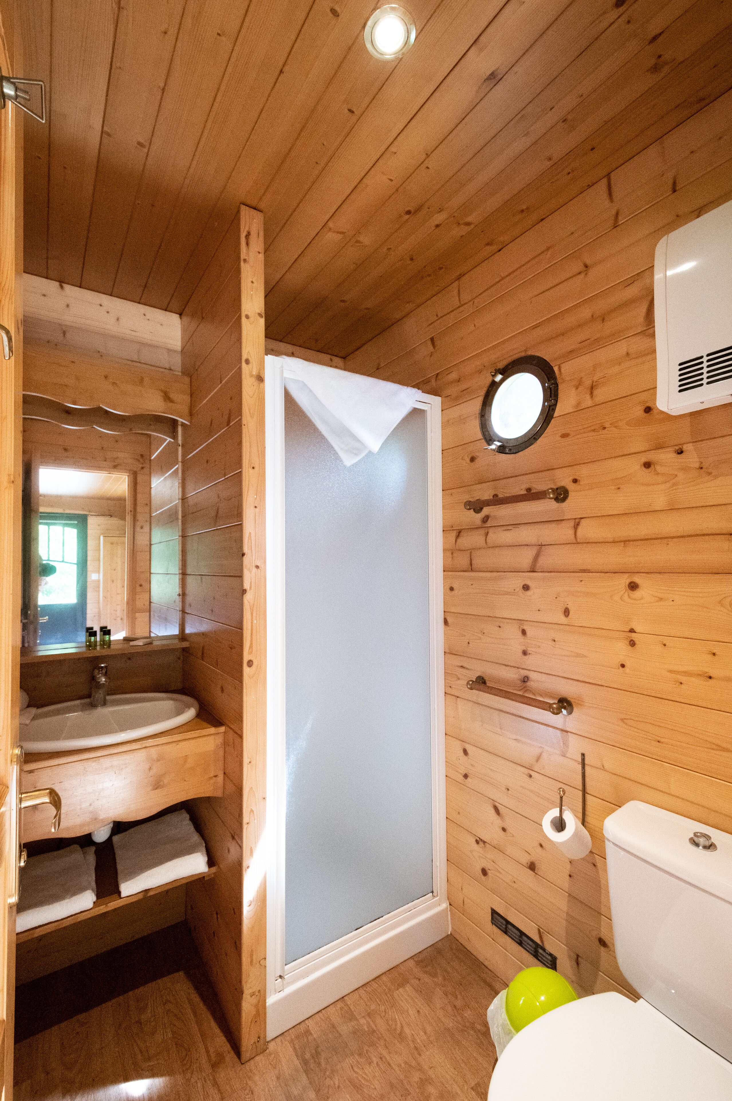 Shower, towels, soap, toilet paper