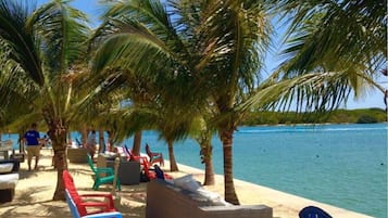 Private beach, white sand, sun-loungers, beach umbrellas