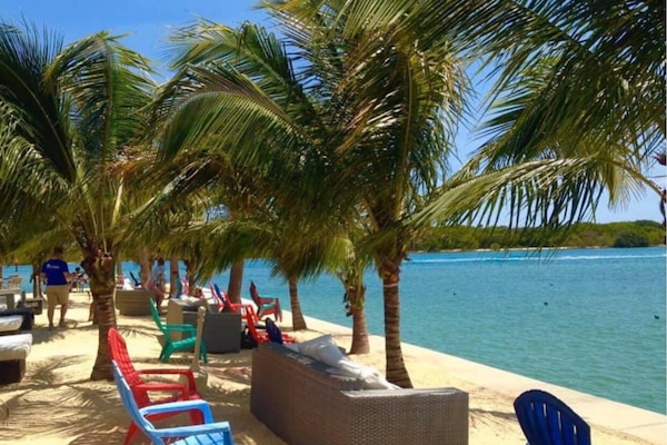 Private beach, white sand, sun-loungers, beach umbrellas