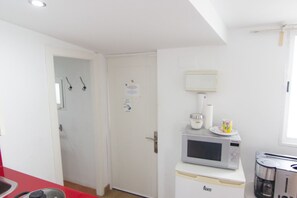 Fridge, microwave, coffee/tea maker, toaster