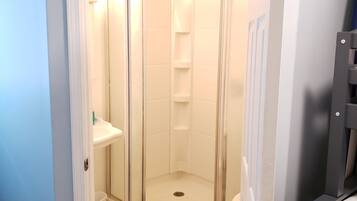 Bathtub, hair dryer, towels, soap