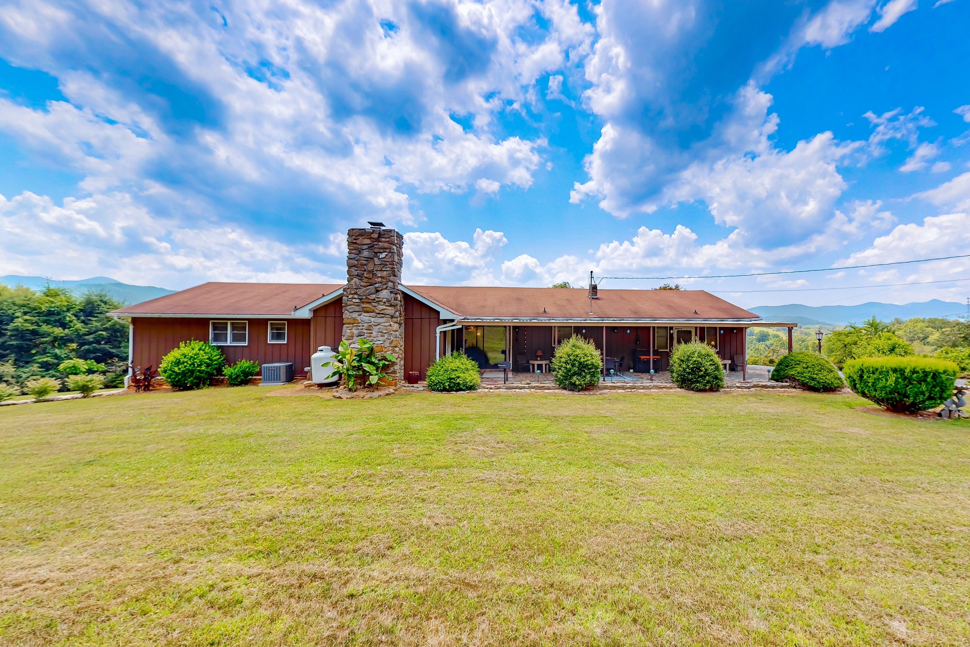 Dog-friendly home with game room, firepit, & panoramic mountain view