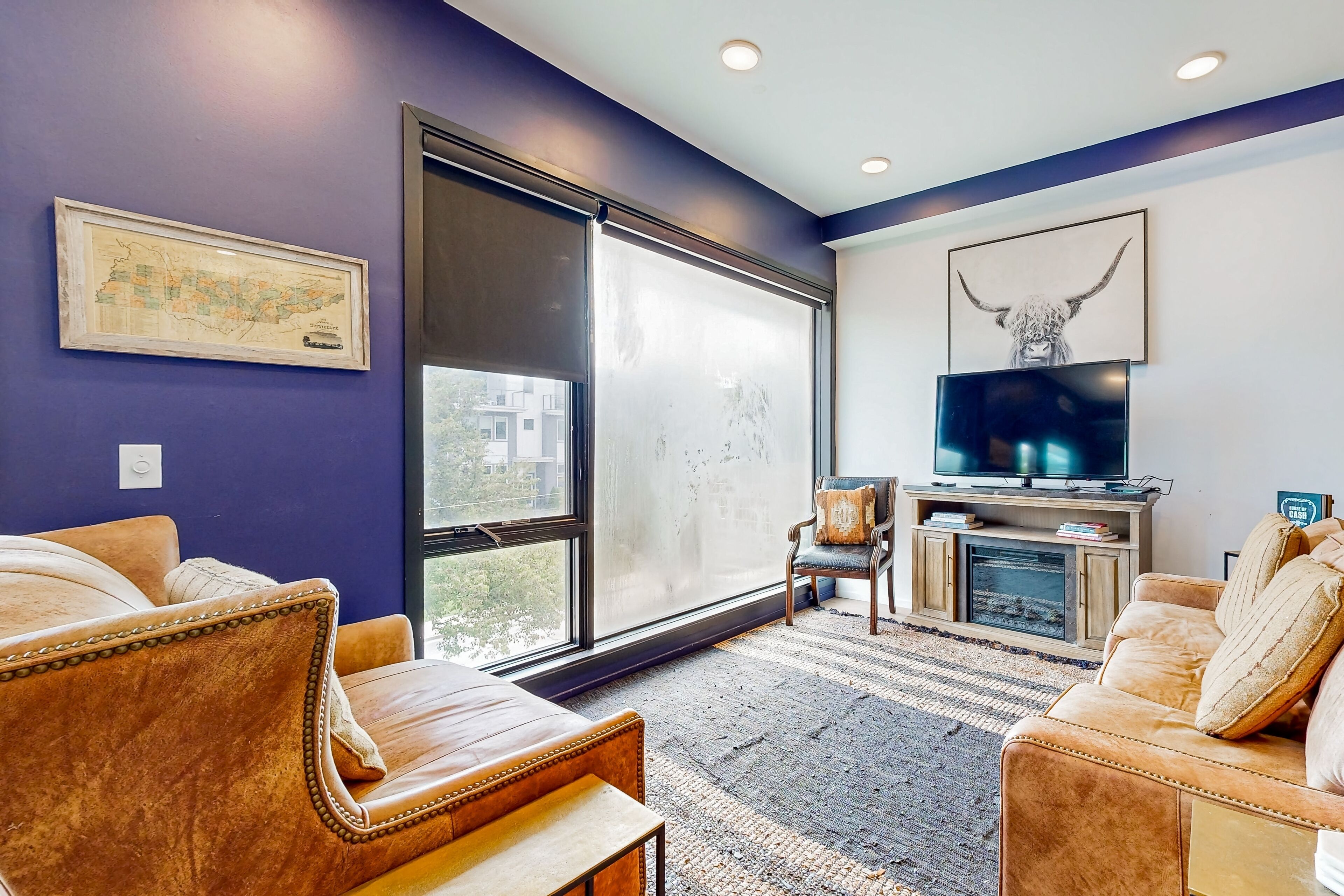 Dog-friendly treetop escape with luxe interior, seasonal pool, balcony, & WiFi