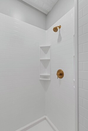 Combined shower/tub, hair dryer, towels, soap