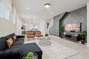Smart TV, fireplace, table tennis, books