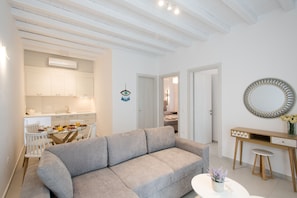 Apartamento superior | Área de estar | TV de tela plana 40 polegadas com canais via satélite, TV, escritórios