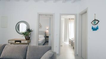 Superior Apartment | Living area | 40-inch flat-screen TV with satellite channels, TV, offices