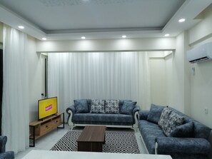 Family Apartment, 2 Bedrooms, Sea View | Living area | TV - Deniz Apart (Demre)