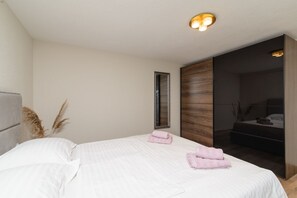 1 غرفة نوم ومكواة/لوح كي وواي فاي مجانًا وملاءات أسرّة