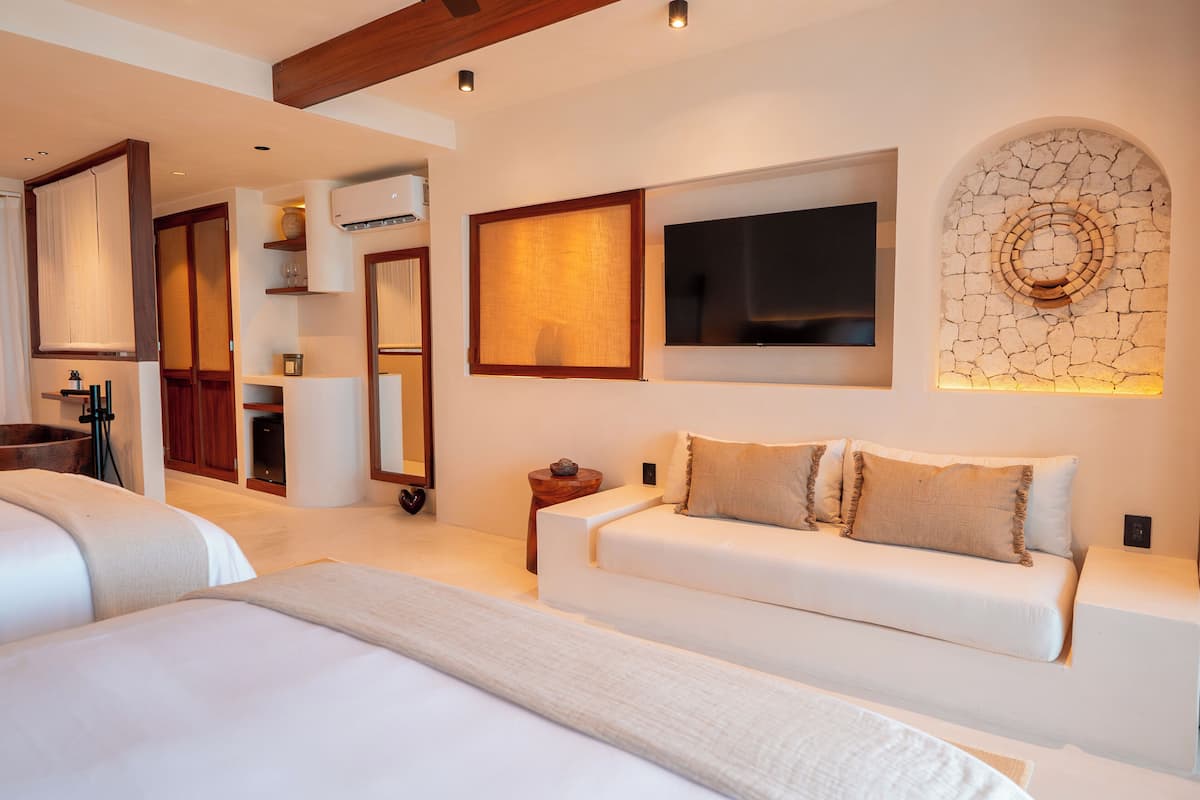Suite estudio Deluxe, 2 camas Queen size, vista al mar | Muebles diferentes, wifi gratis y ropa de cama