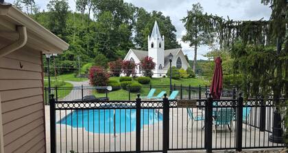 Spacious End Unit with Pool and Creekside Balcony - Walk to Downtown Gatlinburg!