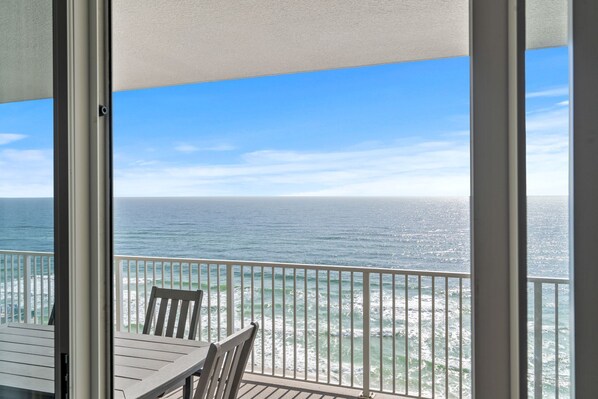 A balcony with a view of the ocean. - Beautiful Beachfront Condo with Amazing Views and Beachfront Pool! Chair Service Included* (Panama City Beach)
