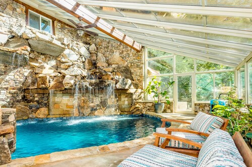 Riverside opulence with game room, private heated pool, hot tub & firepit