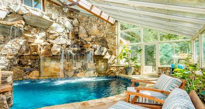 Riverside opulence with game room, private heated pool, hot tub & firepit