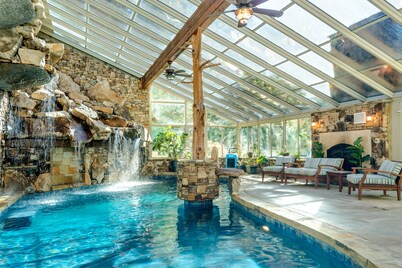 Riverside opulence with game room, private heated pool, hot tub & firepit