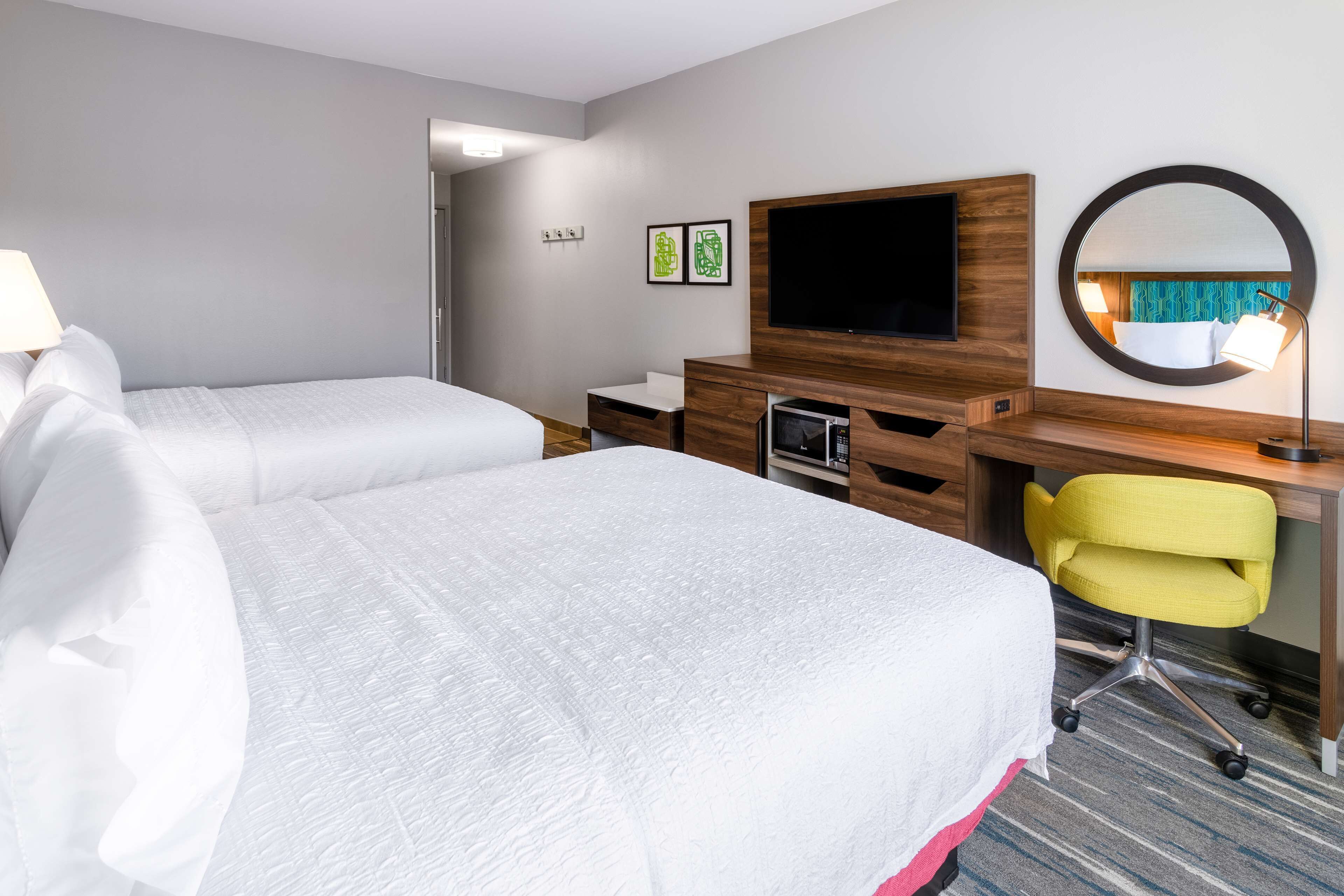 room, 2 queen beds, refrigerator & microwave | in-room safe, desk, blackout curtains, iron/ironing board