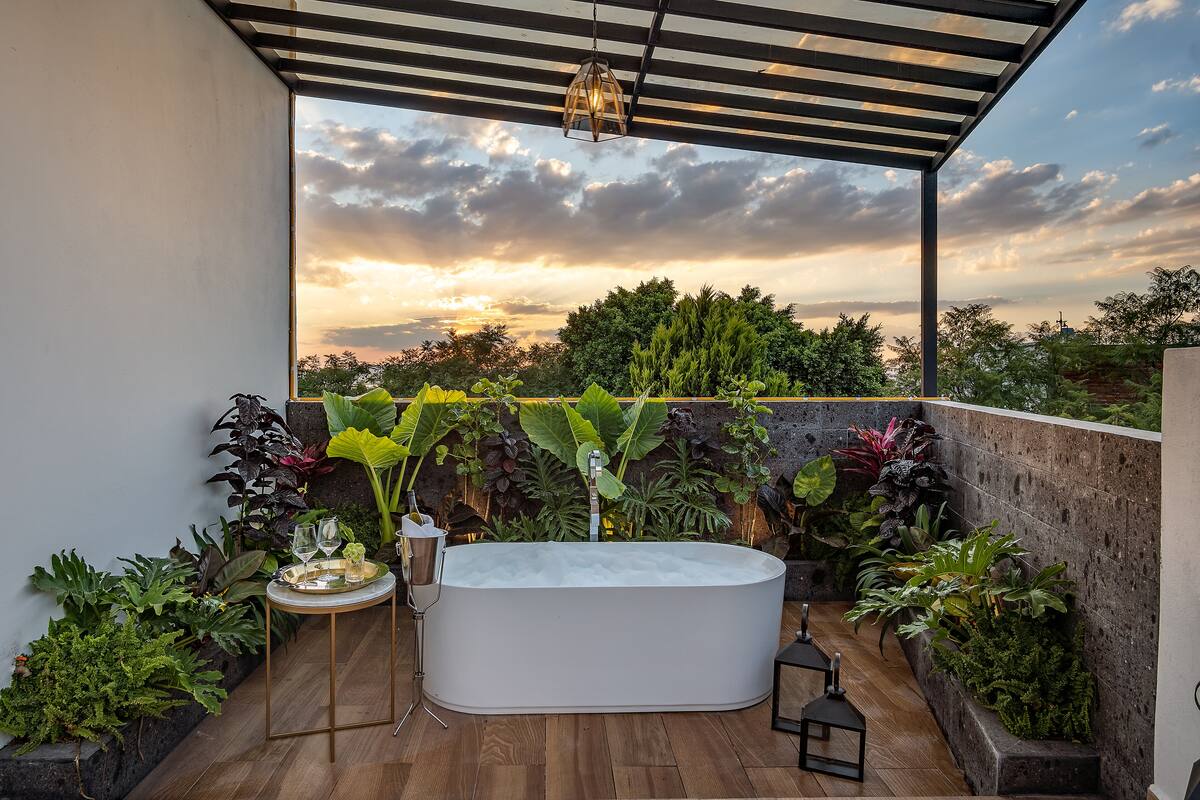 Honeymoon Room | Bathroom | Shower, slippers, towels