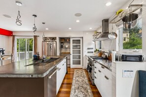 Fridge, microwave, oven, stovetop - The Summit On Sixth Street-LUXURY MODERN 4BR Home (Cleveland)