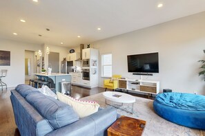 TV, fireplace, books