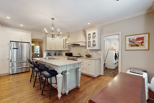 Expansive Designer Estate w/ TV Room, Spacious Kitchen & Large Yard dog friendly