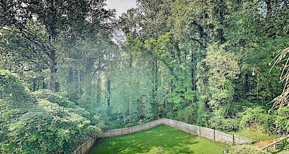 Dog-friendly downtown retreat with 2 kitchens & large fenced yards