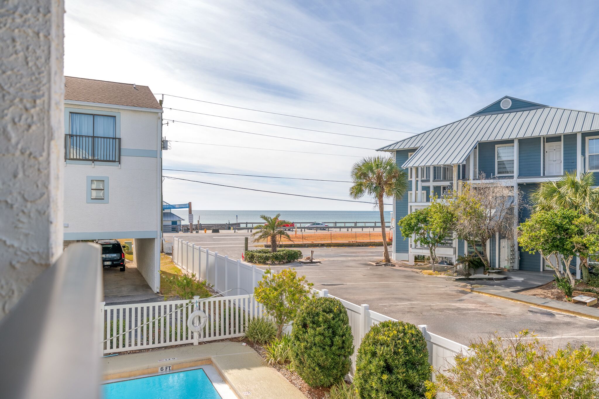 Interior and Exterior Beach Water views, 1 min. walk to beach, sleeping for 6