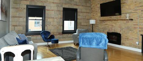 Smart TV, fireplace, books