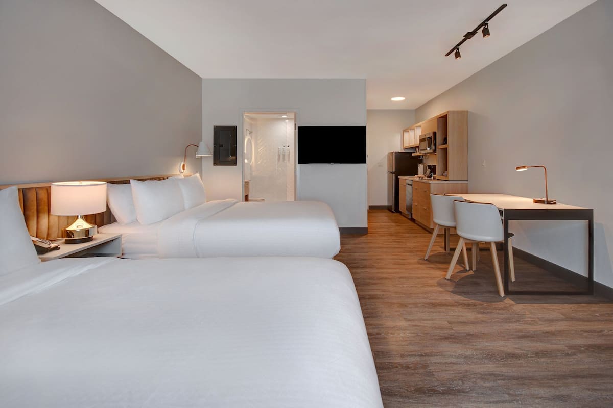 desk, laptop workspace, blackout curtains, iron/ironing board