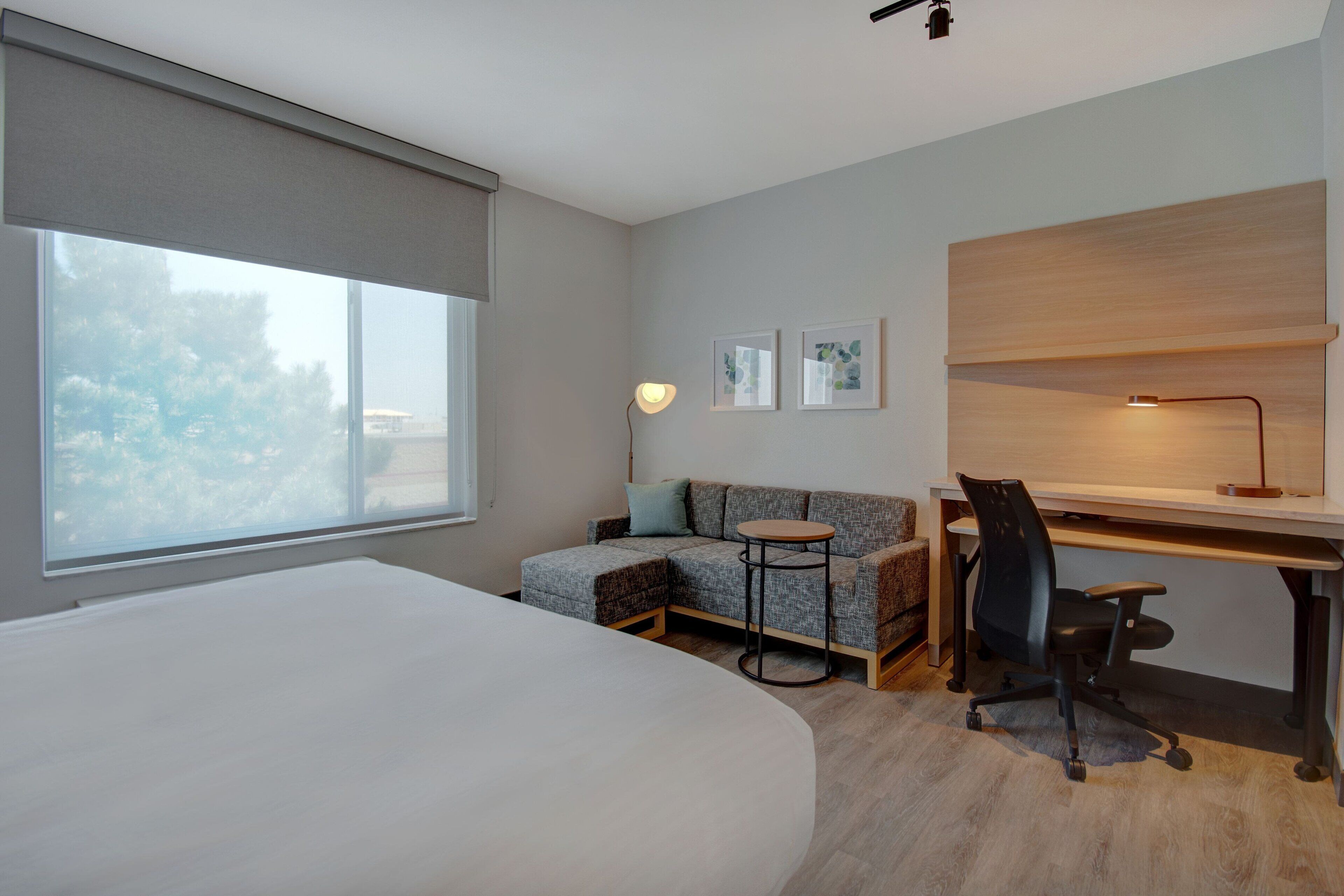 desk, laptop workspace, blackout curtains, iron/ironing board