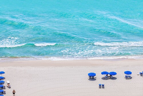 Private Oceanfront Condominium with Beach Access and Resort Services