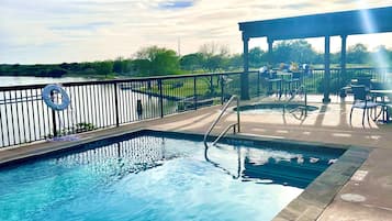Outdoor pool, open 7:00 AM to 11:00 PM, pool umbrellas, pool loungers