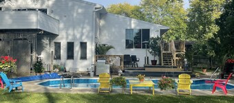 Contemporary home in quiet neighborhood with pool & great back yard close to all