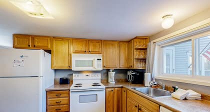 Riverfront studio with river view, full kitchen, & free WiFi